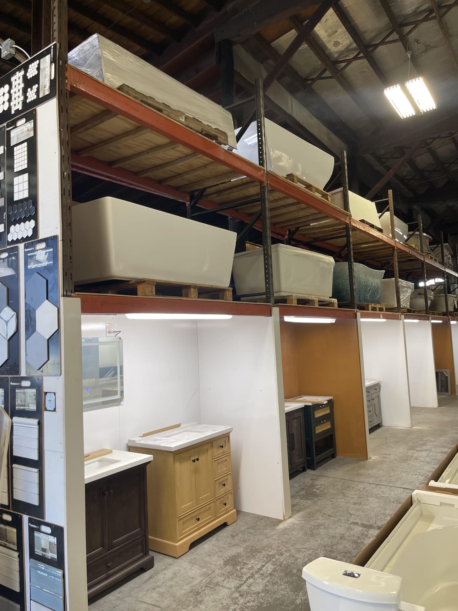 Bathroom vanities and fixtures in the Millhurst Trading warehouse