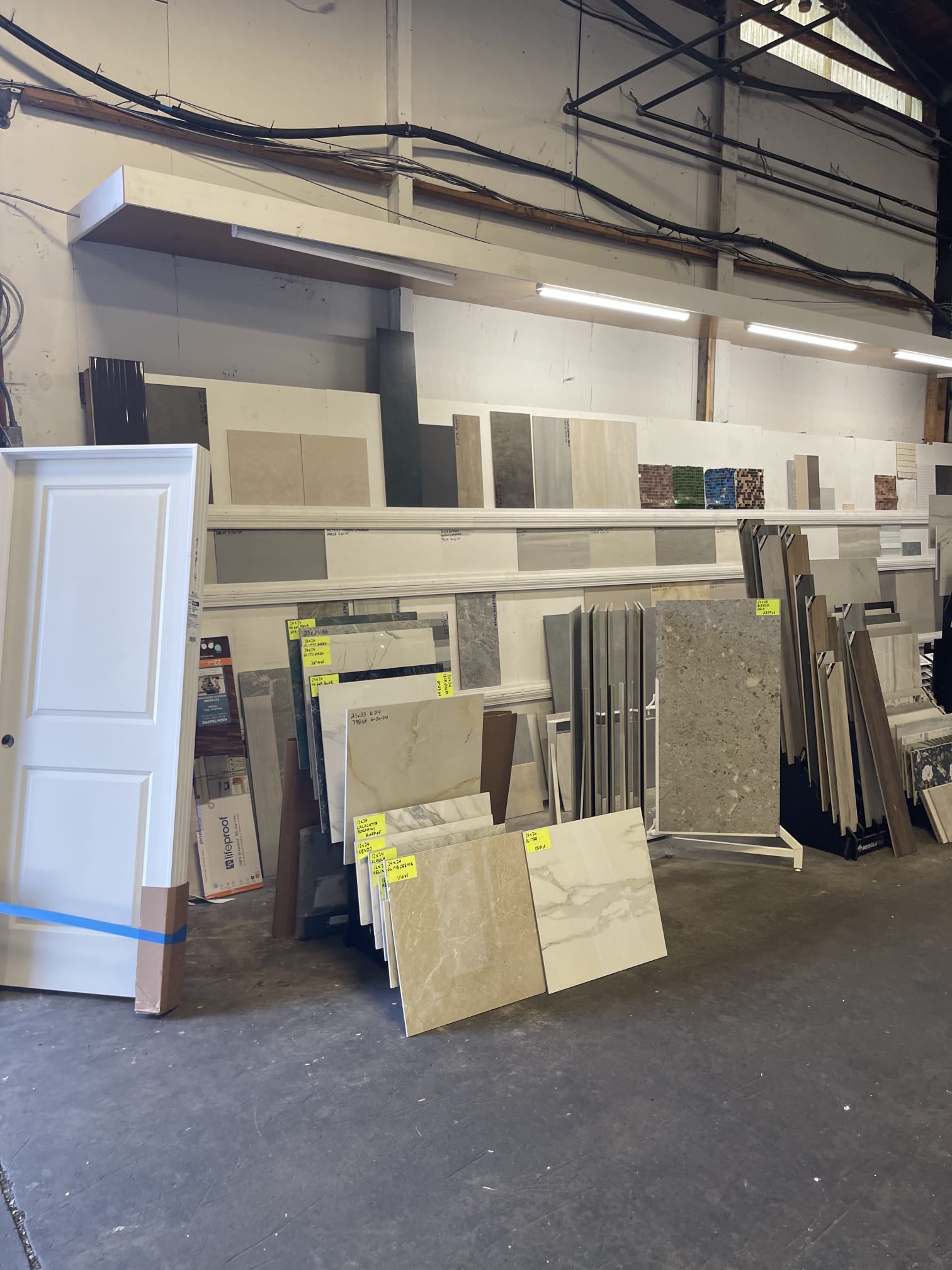 Granite and quartz slabs staged in the warehouse